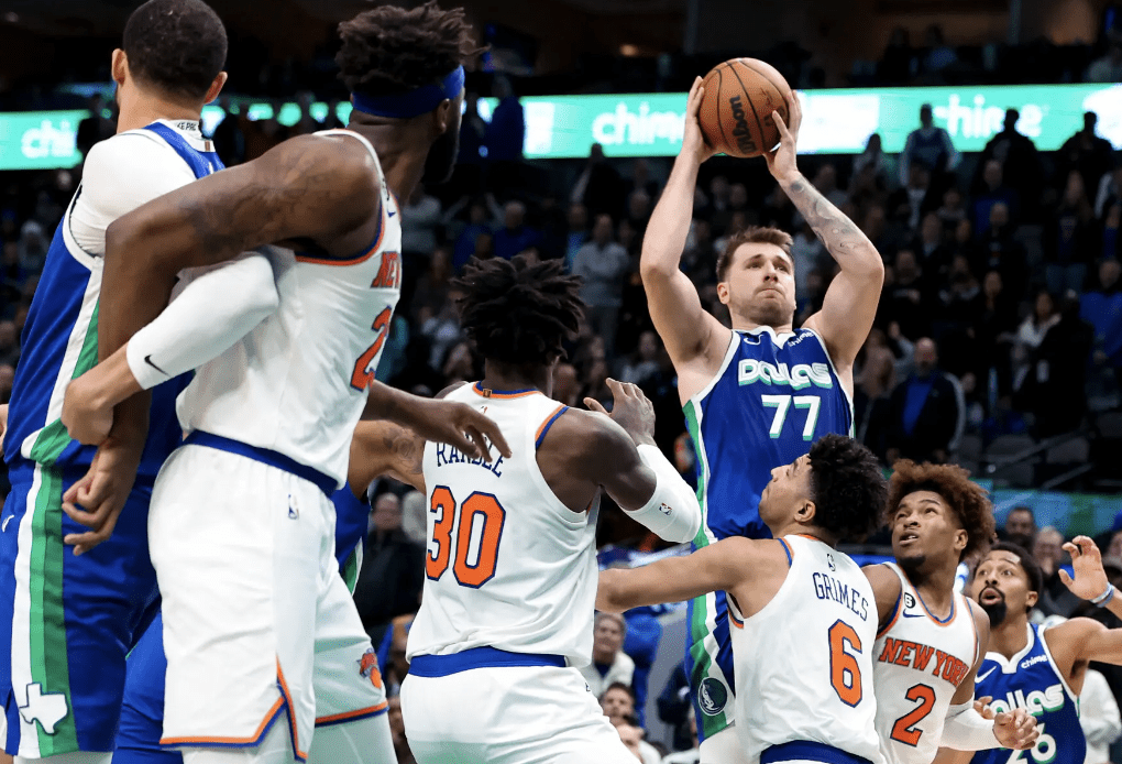 Luke Doncic Jumping Over knicks player to shoot