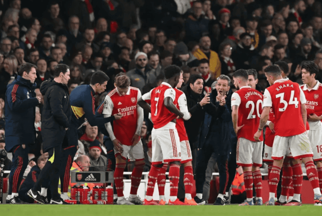 Arsenal Team Talk in Premier League Match